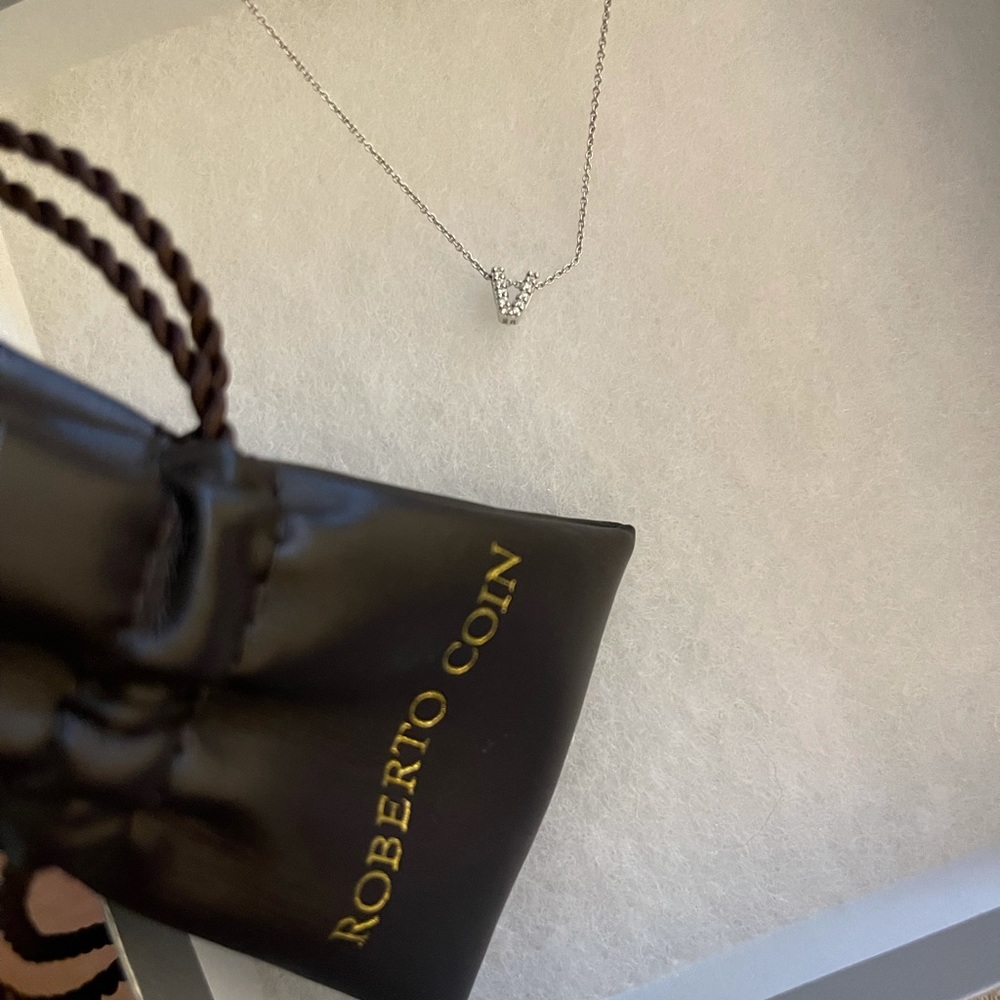 Necklace with initial “V”